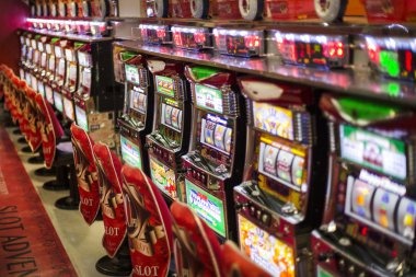 oldtoto mobile app interface showing Liga 1 fixtures and live casino tables